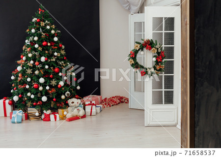 Interer home Christmas tree with gift lights garland decor new year 71658537