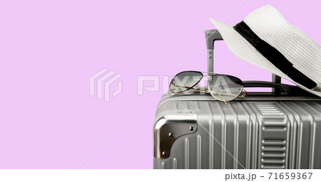 Travel bag with accessories on color background 71659367