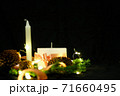 Pink Christmas decorations with candlels on a black background 71660495