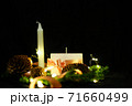Pink Christmas decorations with candlels on a black background 71660499