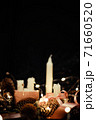 Pink Christmas decorations with candlels on a black background 71660520