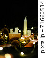 Pink Christmas decorations with candlels on a black background 71660534