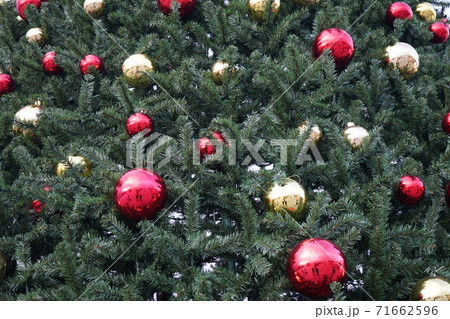 christmas tree with multi-colored balls and decorations background 71662596