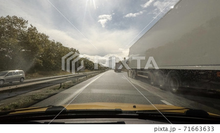 Driving on highway point of view 71663633