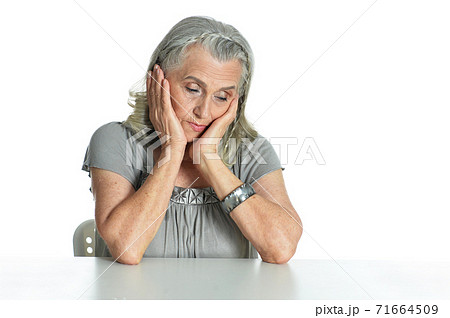 Portrait of sad senior woman posing isolated Portrait of sad senior woman posing isolated 71664509