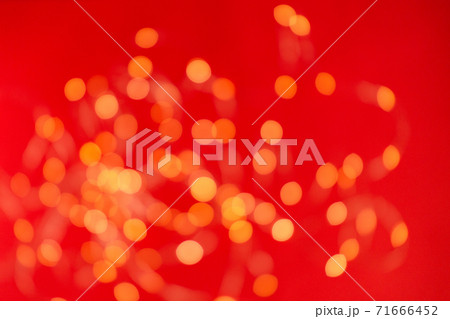 Christmas holiday background with festive bokeh on red background. Ready-to-install products. blur 71666452