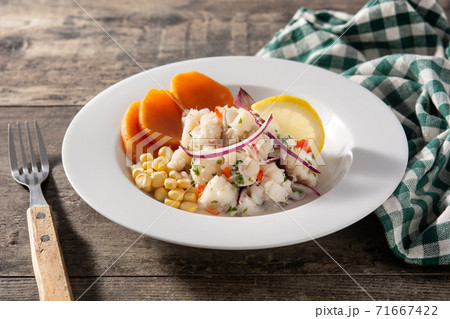 Traditional peruvian ceviche with fish, sweet potato, corn and vegetables Traditional peruvian ceviche with fish, sweet potato, corn and vegetables 71667422