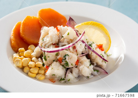 Traditional peruvian ceviche with fish, sweet potato, corn and vegetables Traditional peruvian ceviche with fish, sweet potato, corn and vegetables 71667598