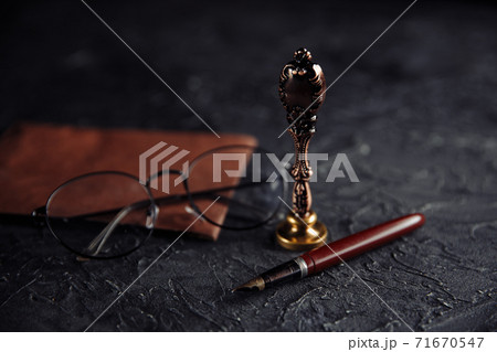 Law concept with stamp, pen, glasess and envelope. Notary public tools 71670547