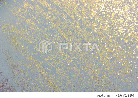 Gray background with golden glitter. Gray background with golden glitter. 71671294