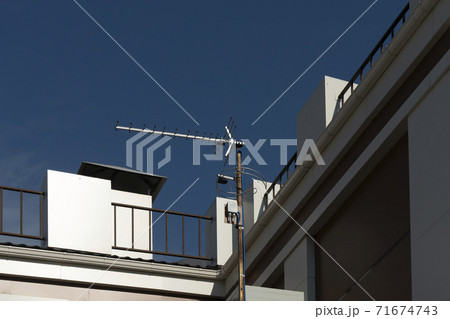Radio receiving antenna on the roof of the building. Radio receiving antenna on the roof of the building. 71674743