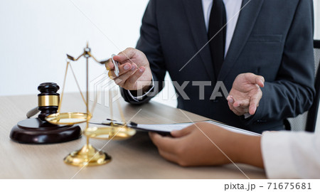 Attorneys or consultants work in the courtroom and negotiate with clients or complainants who want justice in corporate fraud cases, Litigation and justice concept. Attorneys or consultants work in the courtroom and negotiate with clients or complainants who want justice in corporate fraud cases, Litigation and justice concept. 71675681