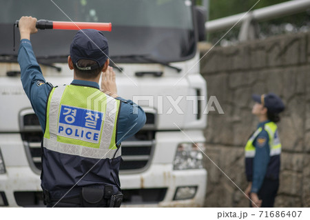 Asian male and female two police officers 137 Asian male and female two police officers 137 71686407