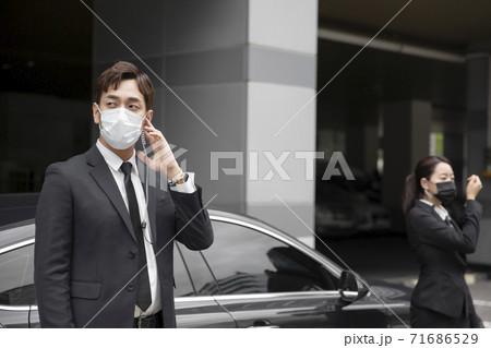 Asian male and female two security guards 049 71686529