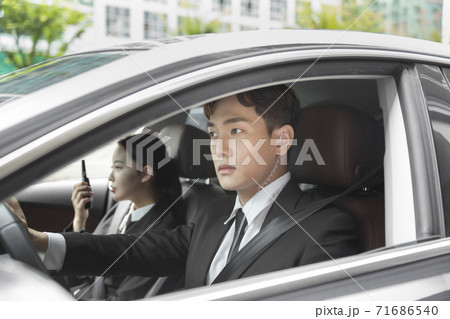 Asian male and female two security guards 055 71686540