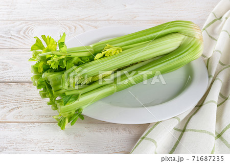 parts Encommium request One bunch of fresh green celery stalks on a...の写真素材 [71687235] - PIXTA