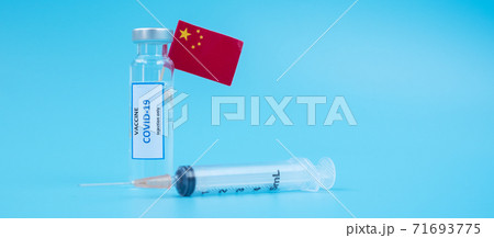 COVID-19 Vaccine vial, injection Needle Syringe and Chinese flag against Coronavirus infection in hospital laboratory. Medical, health, Vaccination and immunization concept COVID-19 Vaccine vial, injection Needle Syringe and Chinese flag against Coronavirus infection in hospital laboratory. Medical, health, Vaccination and immunization concept 71693775