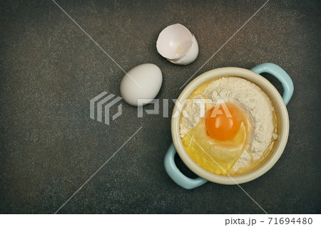 Flat lay of baking ingredients on table Flat lay of baking ingredients on table 71694480