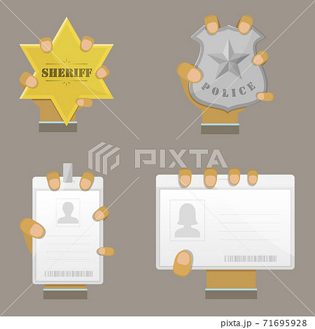 Mans Hand Holding Different Badges. 71695928