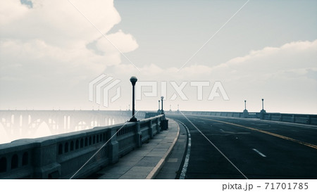 long bridge in misty fog long bridge in misty fog 71701785