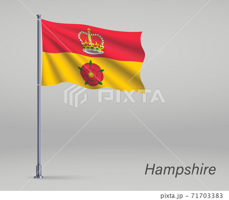 Waving flag of Hampshire - county of England on flagpole. Templa 71703383