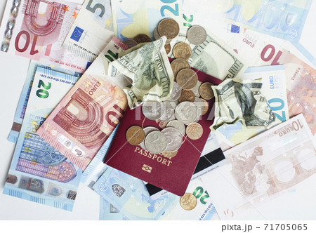 Cash on table isolated: dollars, euro, rubl broken money. All in mess, global crisis . passport travel concept Cash on table isolated: dollars, euro, rubl broken money. All in mess, global crisis . passport travel concept 71705065