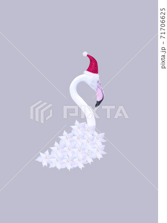 Contemporary collage. 3D illustration. Abstract Christmas background with white flamingos in a red cap on a gray background. 71706625
