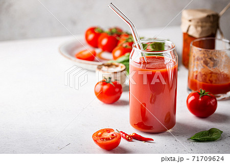 Glass of tomato juice 71709624