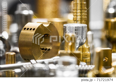 different shapes and sizes of parts turned on a lathe or milling machine 71721974