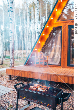 BBQ fish steaks. Pieces of salmon are fried over an open fire. BBQ fish steaks. Pieces of salmon are fried over an open fire. 71724177