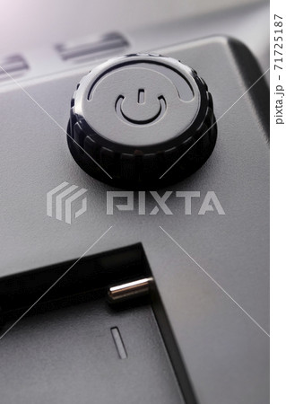 On off button with power adjustment function. Brilliant contacts of the connector for the battery in a plastic black case. Dark contrast view 71725187
