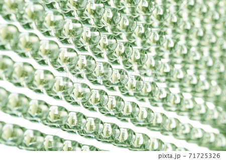Straight rows of LEDs in the light panel close-up. Green neon shade. Green energy concept Straight rows of LEDs in the light panel close-up. Green neon shade. Green energy concept 71725326