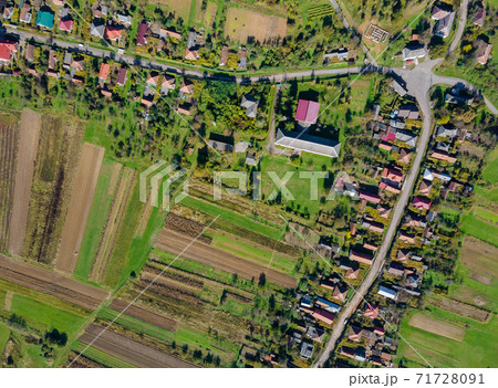 Aerial view of the European beautiful village with fields 71728091