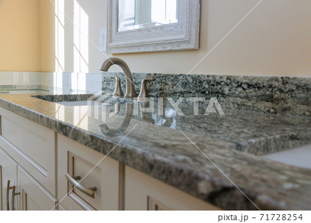 Modern grey marble countertop designer bathroom with sinks bathtub Modern grey marble countertop designer bathroom with sinks bathtub 71728254