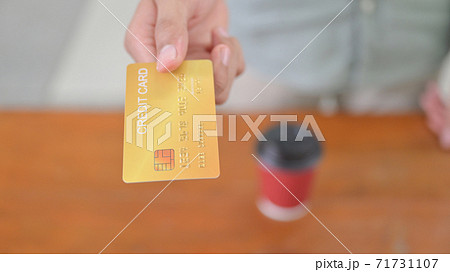 Close-up shot of Paying by credit card. Close-up shot of Paying by credit card. 71731107