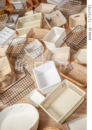 Flat lay of Marie Kondo's storage boxes, containers and baskets with different sizes and shapes 71734781