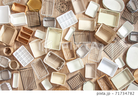 Flat lay of Marie Kondo's storage boxes, containers and baskets with different sizes and shapes 71734782