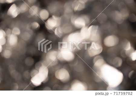 Abstract blurred gold background with beautiful bokeh effect. Abstract blurred gold background with beautiful bokeh effect. 71739702