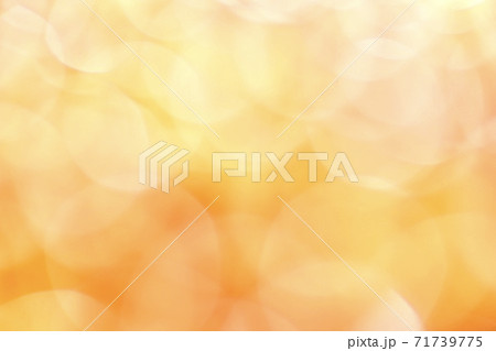 Sunny light blurred background. Many translucent large bokeh circles in yellow, orange and white. Sunny light blurred background. Many translucent large bokeh circles in yellow, orange and white. 71739775