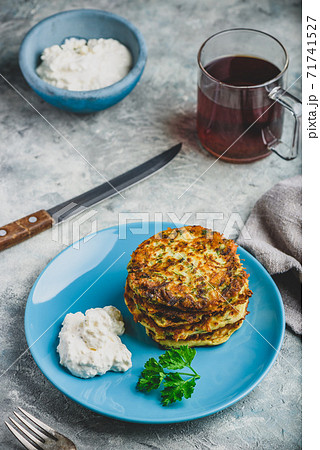 Zucchini parmesan pancakes with dip Zucchini parmesan pancakes with dip 71741527