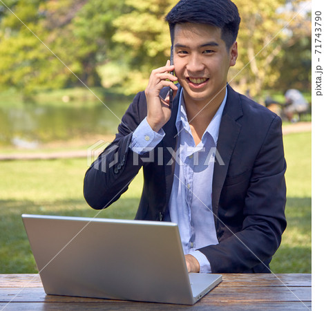 Asian business men working in the garden Asian business men working in the garden 71743790