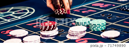 Betting and playing roulette in casino, gambling ad Betting and playing roulette in casino, gambling ad 71749890