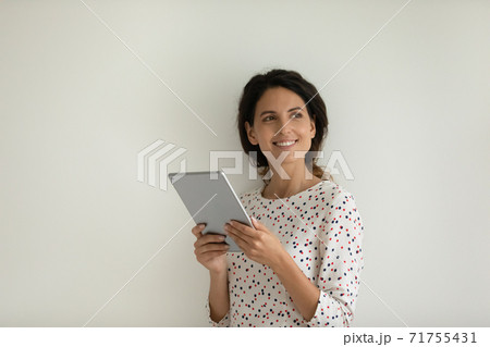 Happy female use modern tablet gadget browsing internet Happy female use modern tablet gadget browsing internet 71755431