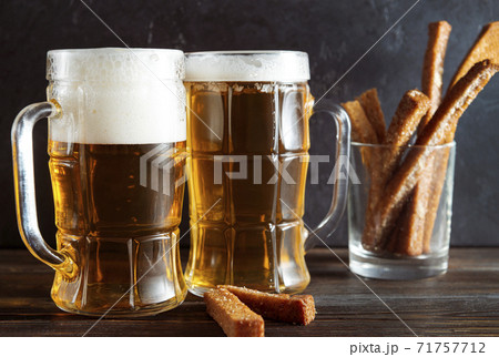 glasses of light beer with croutons, alcoholic drink with appetizer glasses of light beer with croutons, alcoholic drink with appetizer 71757712