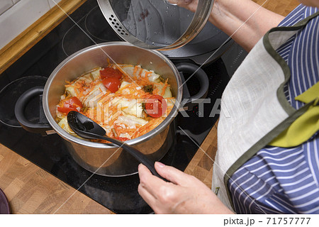 cooking cabbage rolls in a pot at home, cooking cabbage rolls in a pot at home, 71757777