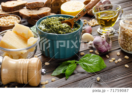 Food background of genovese pesto sauce and its ingredients representing mediterranean cuisine 71759087