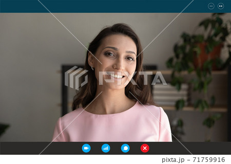 Screen view smiling young mixed race woman holding video call. Screen view smiling young mixed race woman holding video call. 71759916
