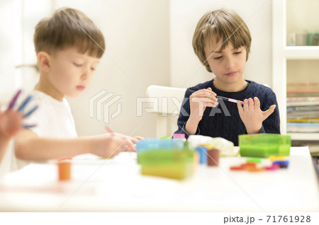 Kid Painting at Kindergarten Kid Painting at Kindergarten 71761928