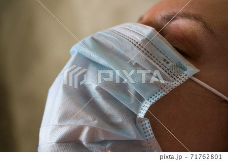 Girl with mask to protect her from Corona virus. Corona virus pandemic. 71762801