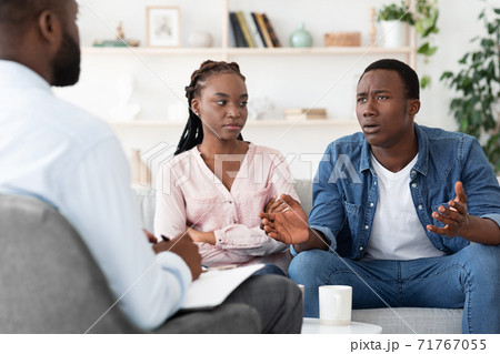 Emotional Black Man Talking To Family Counselor At Marital Therapy Session Emotional Black Man Talking To Family Counselor At Marital Therapy Session 71767055